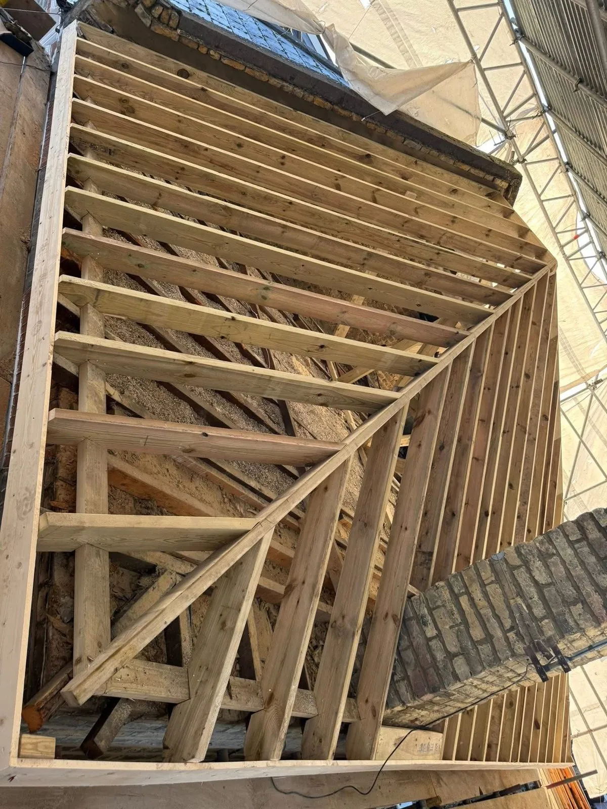 New roof timbers and rafters during a re-roof in Kingsteignton